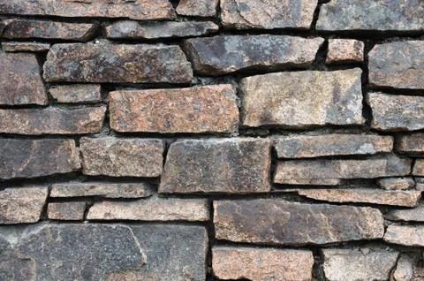Close up on stone wall background Stock Photos