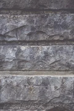 Close up of a stone wall, as a background texture Stock Photos
