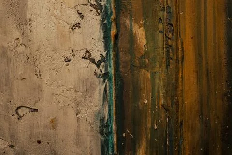 Close up of a stone wall with hints of brown and wood stains Stock Photos