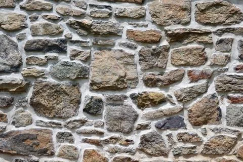 Close up of a stone wall suitable for backgrounds Stock Photos