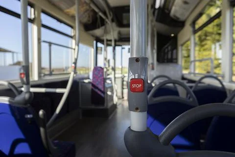 Close up of a stop button inside a public transport vehicle, request to stop, Stock Photos