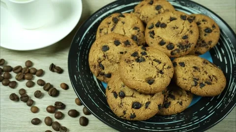 Close up. Stop motion serving chocolate chips with coffee Stock Footage 254976514