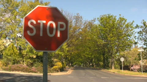 Close up of stop sign on the intersection Video stock 558944