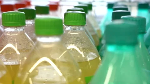 Close-up Store Shelf Row Plastic Bottles Different Colors Drinks. Stock Footage 147908748