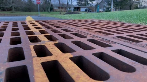 Close up on storm grate dynamic 動画素材 100721597