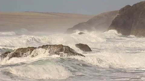 Close up of stormy waves on rocks and cliffs Stock Footage 274231461