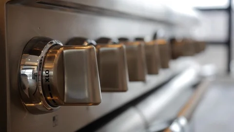Close up of stove dials on high-end stainless steel gas stove. Video stock 98013987