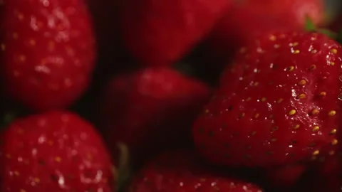 Close-up strawberries with the effect of smooth camera movement along the ber Stock Footage 156727306