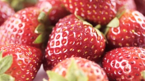 Close up of strawberry fruit rotate Stock Footage 104925732