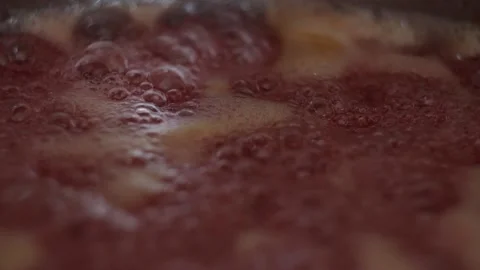 Close up of a Strawberry Jelly while Cooking (50 fps) Stock Footage 233471636