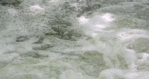 Close up stream flowing, Clean water flowing. Stock Footage 284914478