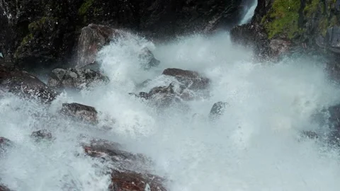 Close up from a stream of the waterfall in Voringfossen Norway Stock Footage 220605220