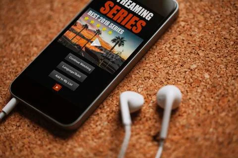 Close up of streaming series app in a mobile phone screen Stock Photos