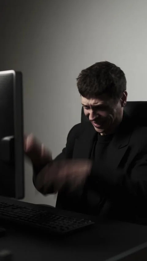 Close up of stressed man aggressively hitting computer keyboard in office anger Stock Footage 318020068