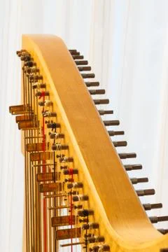 Close up of the string adjustment of a celtic harp. Stock Photos