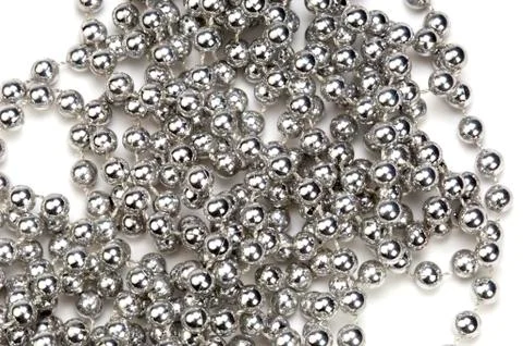 Close-up of string of silver beads 스톡 사진