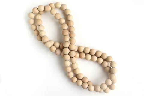 Close up of string of wooden beads Stock Photos