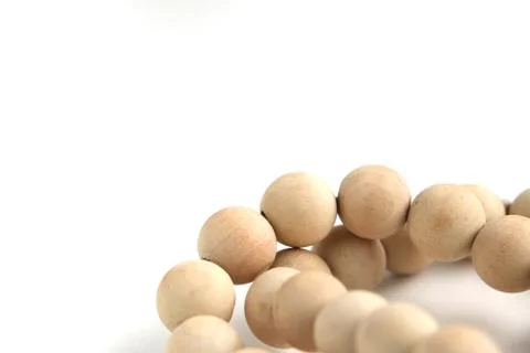 Close up of string of wooden beads Stock Photos