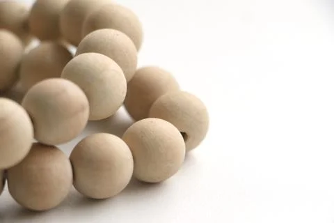 Close up of string of wooden beads Stock Photos