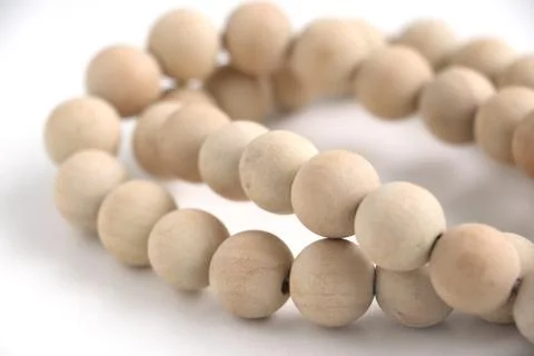 Close up of string of wooden beads Stock Photos
