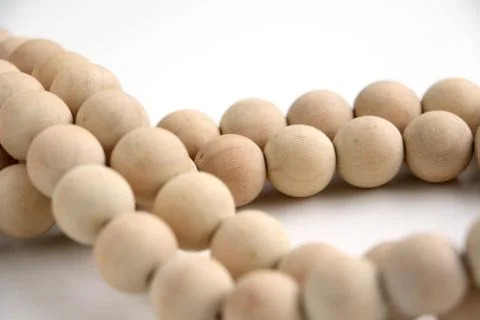 Close up of string of wooden beads Stock Photos