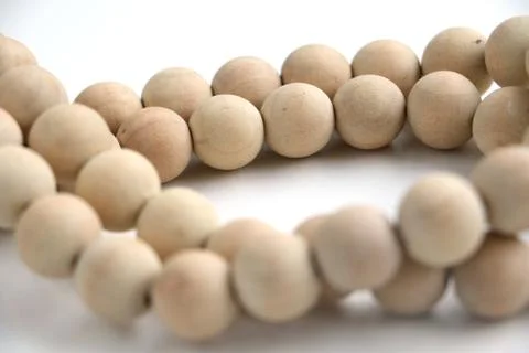 Close up of string of wooden beads Stock Photos