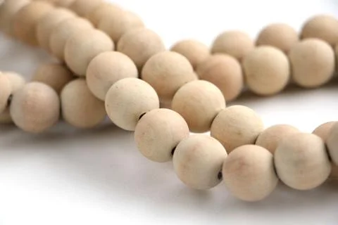 Close up of string of wooden beads Stock Photos