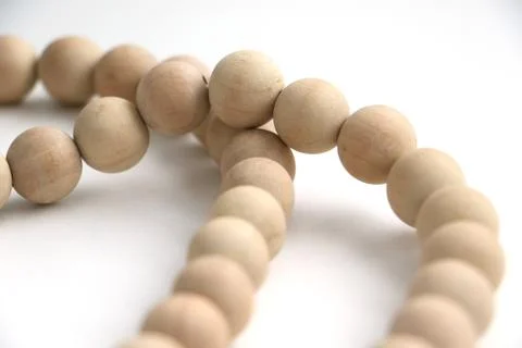 Close up of string of wooden beads Stock Photos