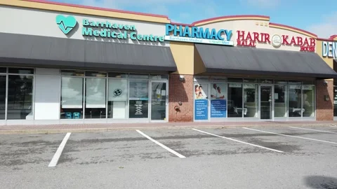 Close up strip mall 4K Stock Footage 136907776