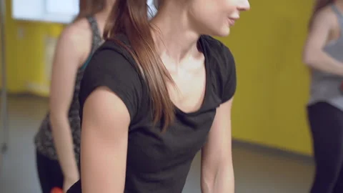 Close up of strong female hands doing strength exercises with dumbbells Stock Footage 131326896