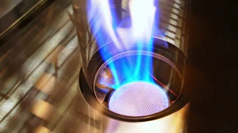 Close-up of a strong fire from a gas burner in a metal grate. Stock Footage 228285068