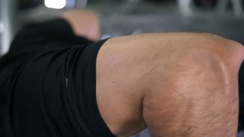 Close-up. Strong man doing push ups 4K Slow Mo 库存影片 100258025
