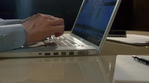 Close-up of strong man is hands typing on laptop Stock-Footage 68712763