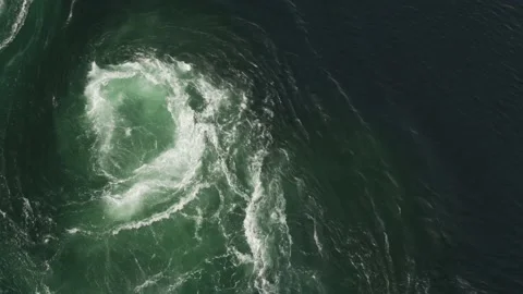 Close up of strong tidal current Saltstraumen in Norway with vortex Stock Footage 238474612
