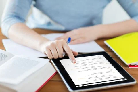 Close up of student with coding on tablet pc 스톡 사진