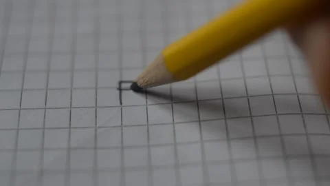 Close-up student hand write relativity science theory by einstein on the paper. Video stock 225494122