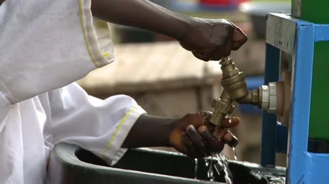 CLOSE UP: STUDENT AT HANDWASHING STATION Stock Footage 60627569