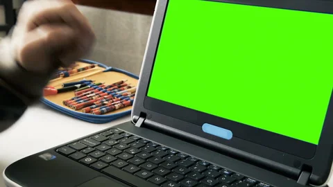 Close Up of Student Laptop with Green Screen Mockup Display and Pencil Case - 4K Stock Footage 242556002