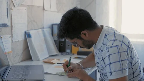Close-Up, Student Makes a Sketch on Sticker, Prepares a Cheat Sheet for Exam Stock Footage 107823695