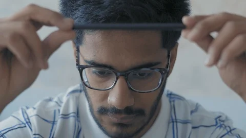 Close-up, Student Rotates in Pencil Hands and Pensively Looks Before Himself Stock Footage 108097800