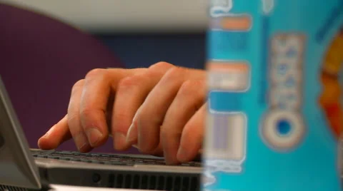 Close on Student Typing at a Laptop Stock Footage 61636391