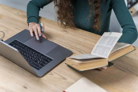 Close up student working with laptop dictionary. High quality photo Stock Photos