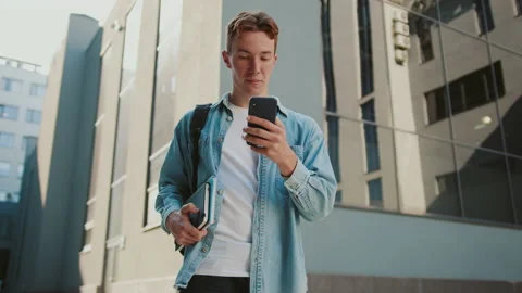 Close up student young handsome man with red hair stand near university or Stock Footage 142049775