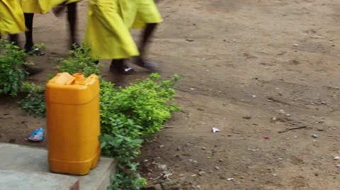 CLOSE UP: STUDENTS' FEET MARCHING PAST CAMERA. Stock Footage 60115266