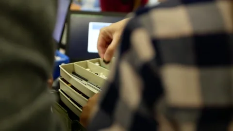 Close-up of a student's hand in an engineering class making a robot Stock-Footage 157174222