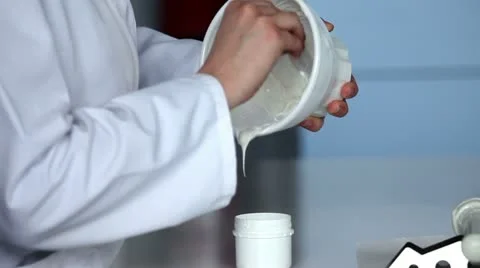 Close up of the student`s hands making creme Stock Footage 27785870