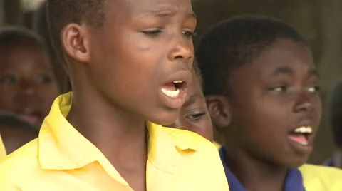 CLOSE UP: STUDENTS SINGING IN A CLASSROOM Stock Footage 60115323