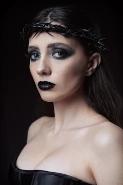 Close-up studio portrait of the gorgeous goth girl. Lovely informal (gothic.. Stock Photos