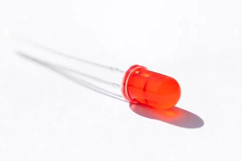 A close up studio portrait of a single red LED or colored Light Emitting Diod Stock Photos