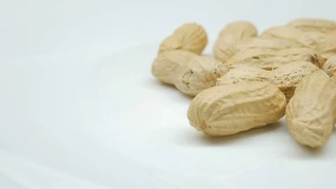 Close-up studio shot footage of peanuts rotates in right side Stock Footage 82633531